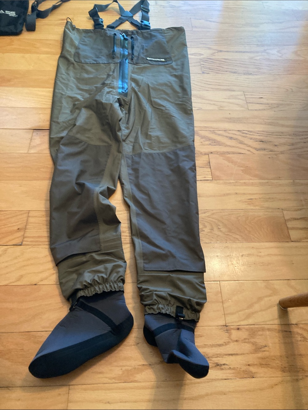 Compass 360 fishing pants with netted attached boots